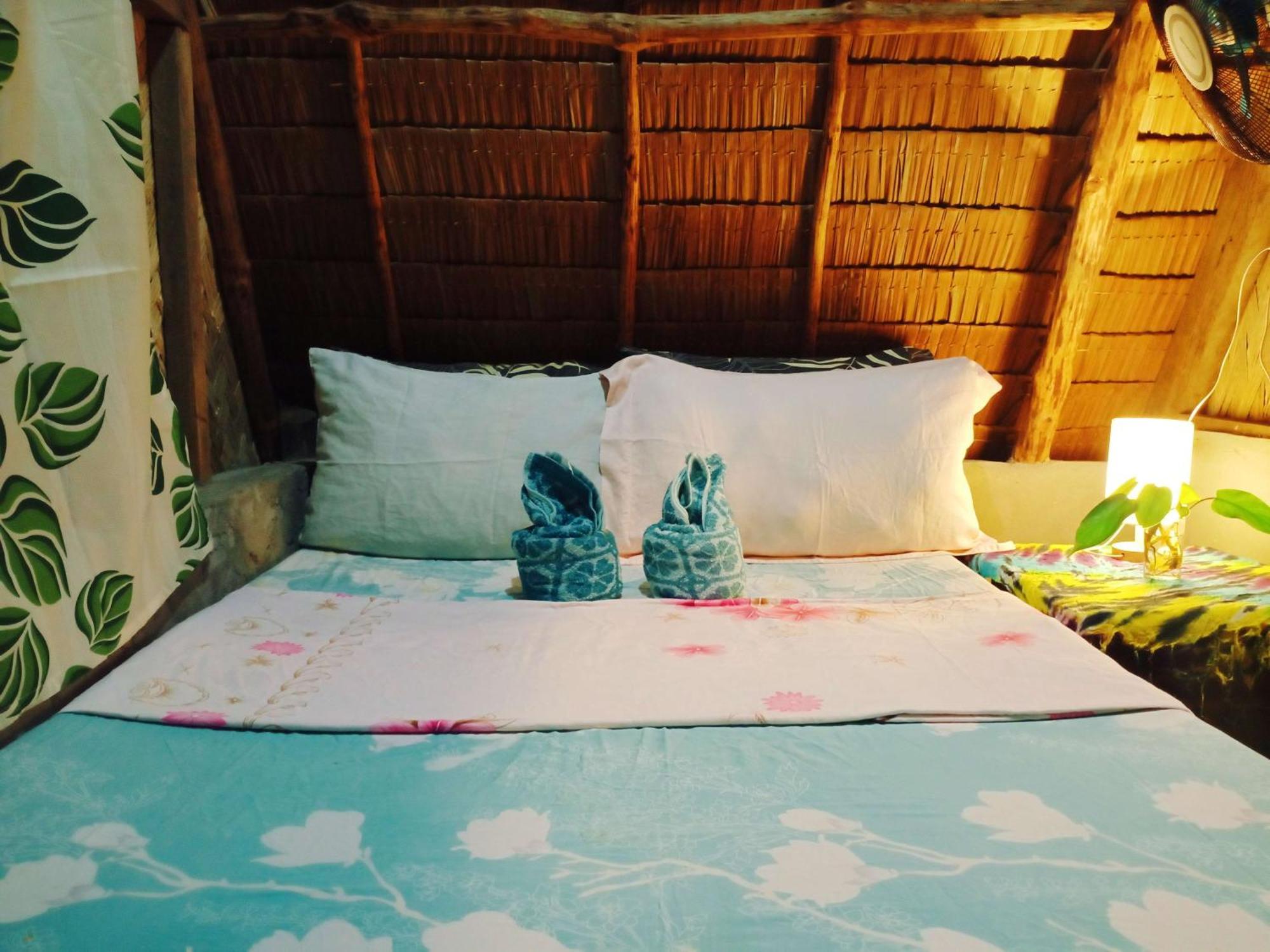Amwani Breeze Apartment El Nido Bagian luar foto